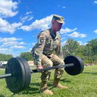 4 / 56 Lt. Col. Lyle Finley, Officer in Charge of the 130th Military History Detachment, North Carolina Army National Guard, conducts Army Combat Fitness Test familiarization during pre-mobilization training at Fort Myer, Virginia May 2021.